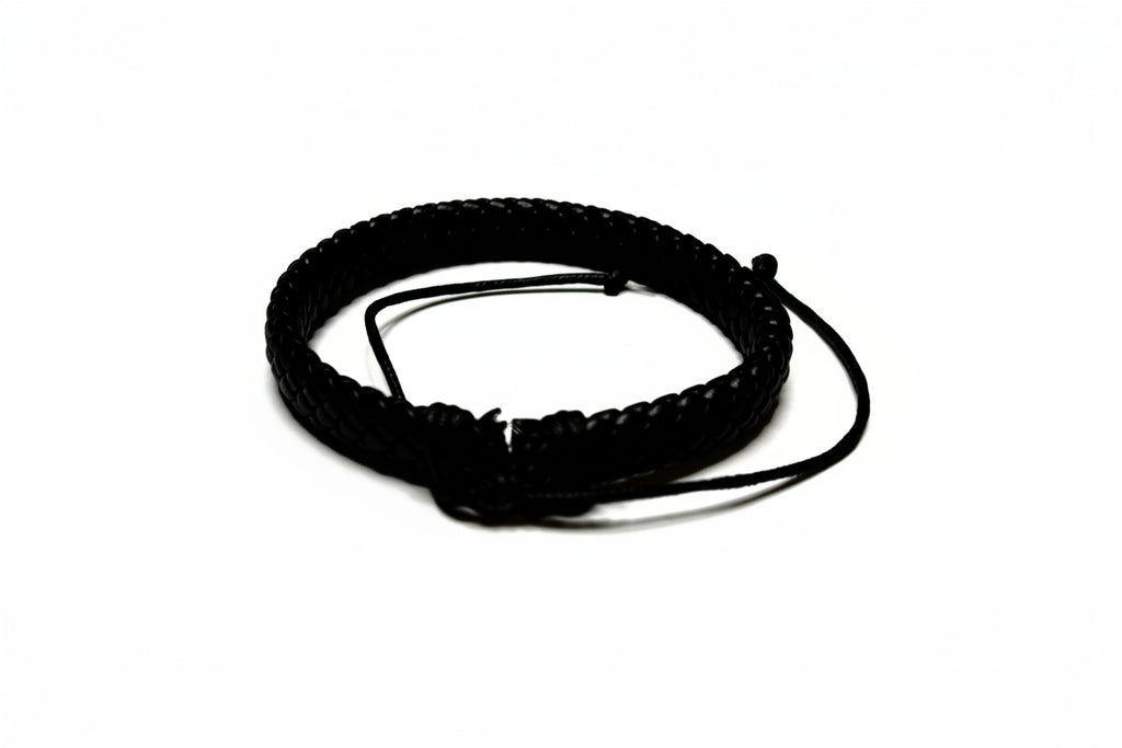 Black braided bracelet on a white background